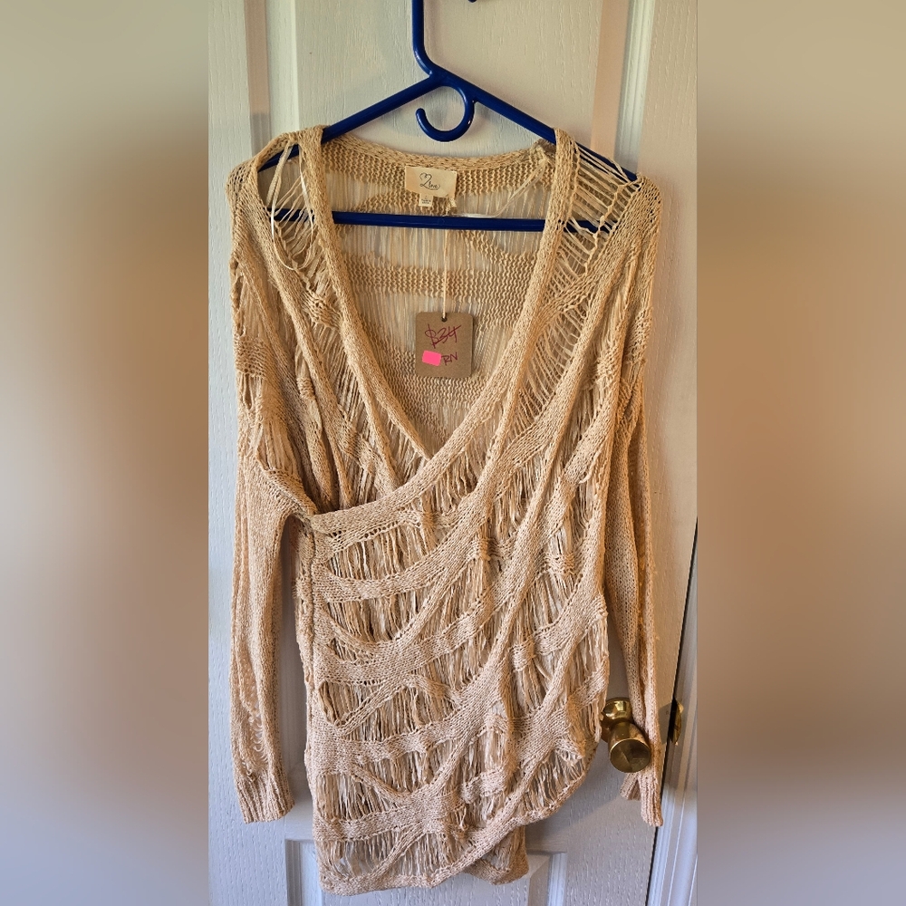 Beige Knit Sweater With Shredded Detail